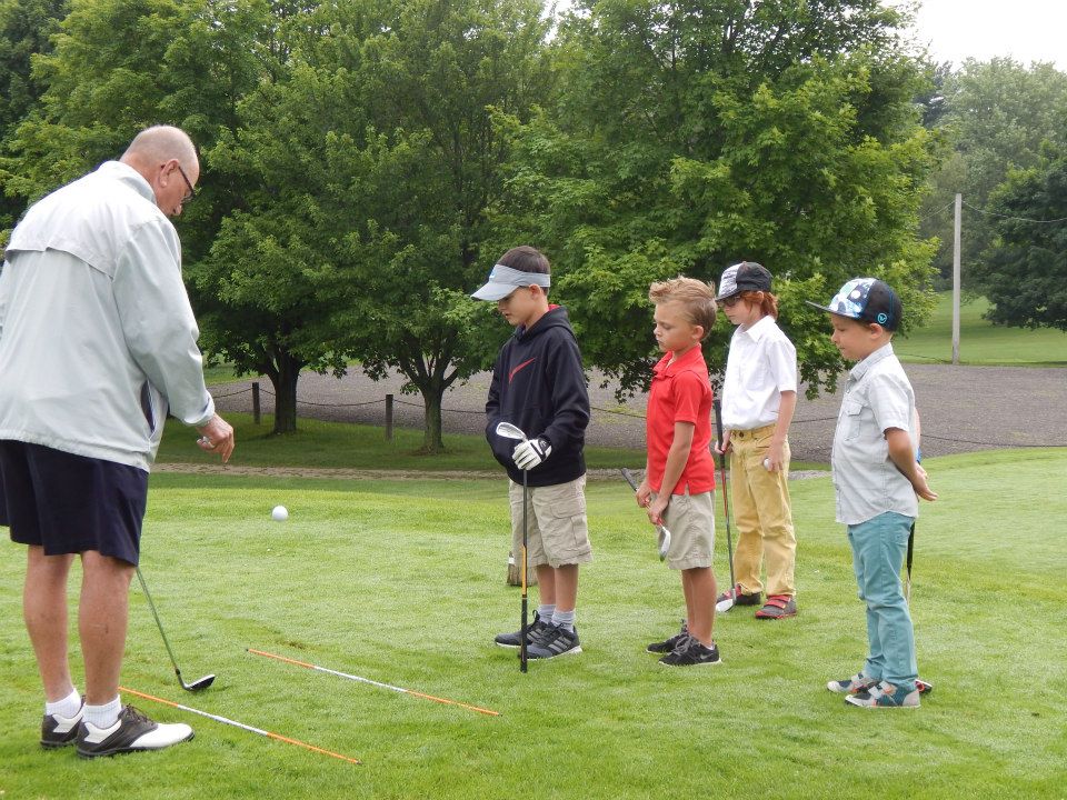A golf lesson on the practice area at Twin Lakes